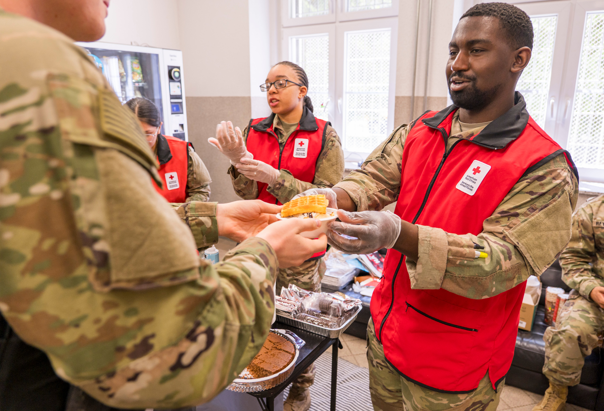 Red Cross volunteers serving troops